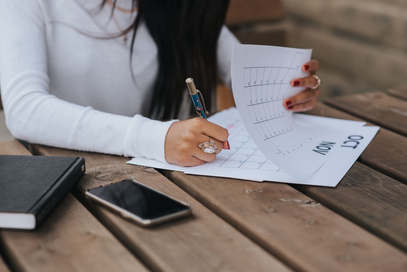 Planning a study schedule on a paper calendar